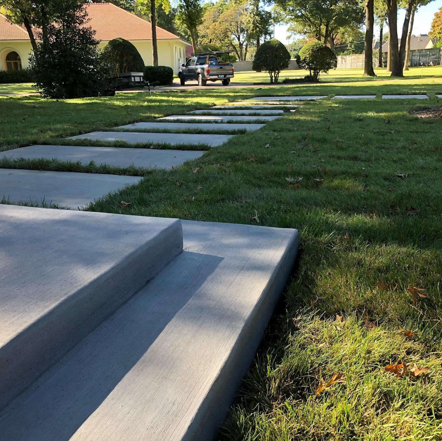 Concrete walkway, steps, and stepping stones by Sol Co. Concrete
